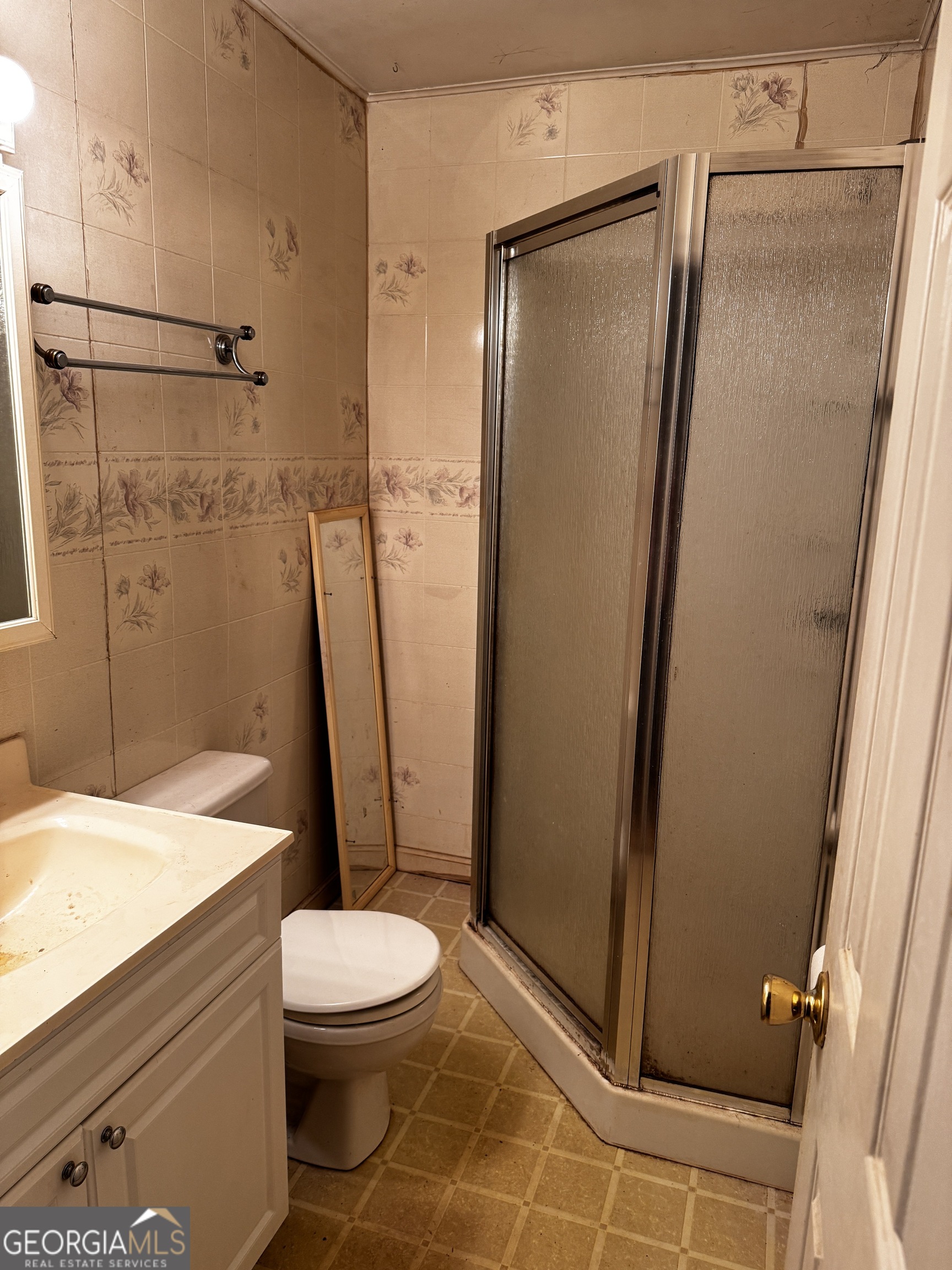 22 Ilene Drive Cleveland, GA 30528 - Photo 48 of 53 a bathroom with a granite countertop toilet sink and a shower