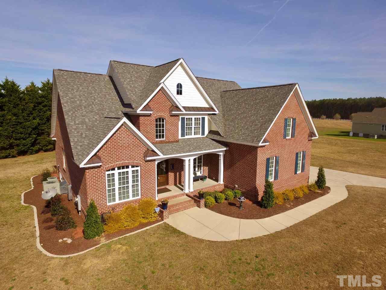 5820 Farmstead Road Bailey, NC 27807 - Photo 1 of 25 a front view of a house with entertaining space