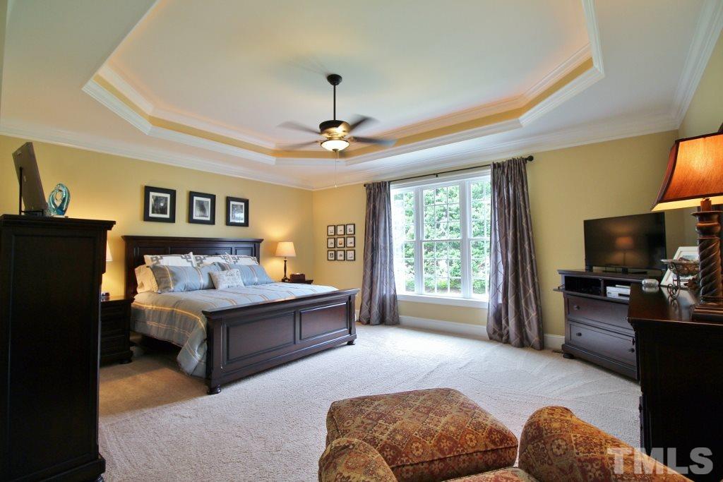 5820 Farmstead Road Bailey, NC 27807 - Photo 22 of 25 a bedroom with a bed and a couch