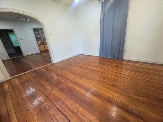 a bathroom with a sink vanity and a toilet