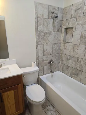 a bathroom with a white tub