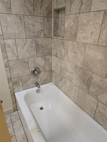 a view of small space with wooden floor