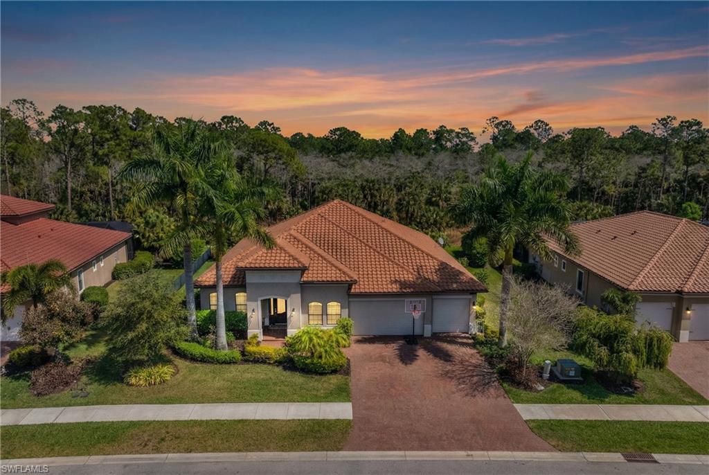 1511 Mockingbird Drive Naples, FL 34120 - Photo 23 of 44 an aerial view of a house