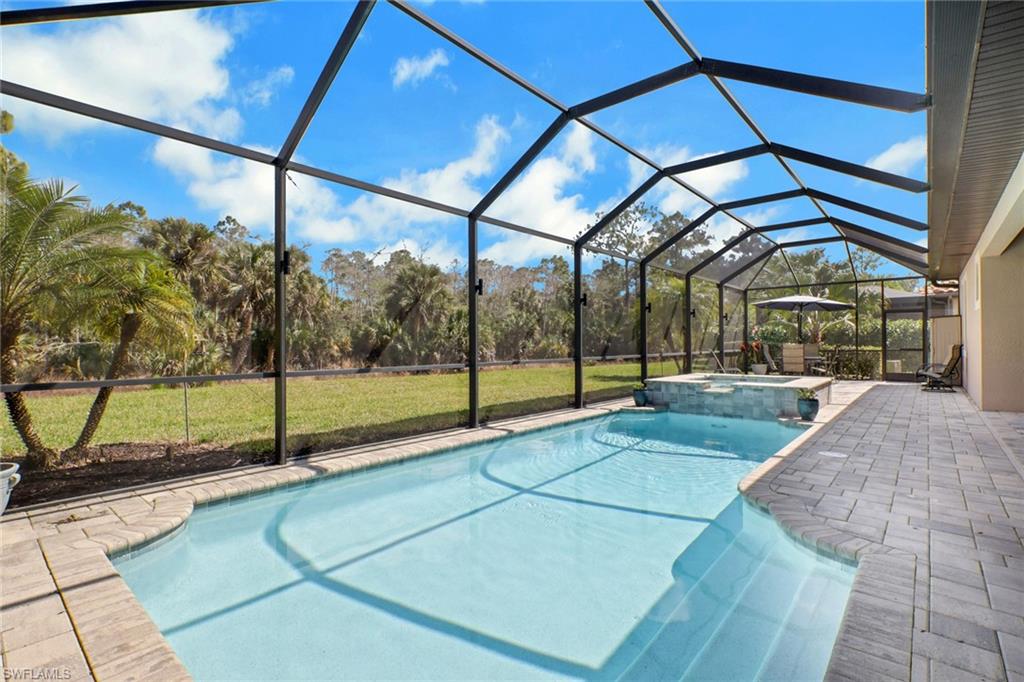 1511 Mockingbird Drive Naples, FL 34120 - Photo 35 of 44 a view of a backyard