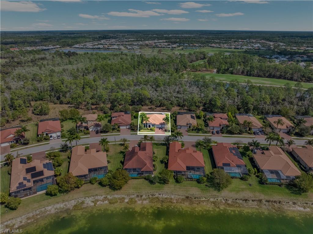 1511 Mockingbird Drive Naples, FL 34120 - Photo 41 of 44 an aerial view of a house with a yard