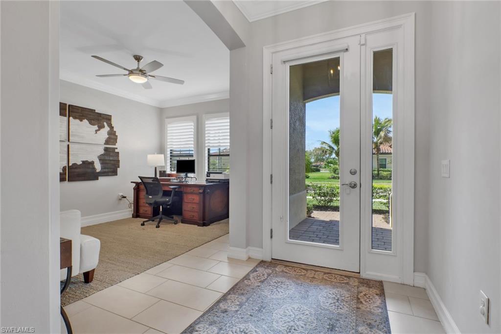 1511 Mockingbird Drive Naples, FL 34120 - Photo 7 of 44 a living room with furniture and a window