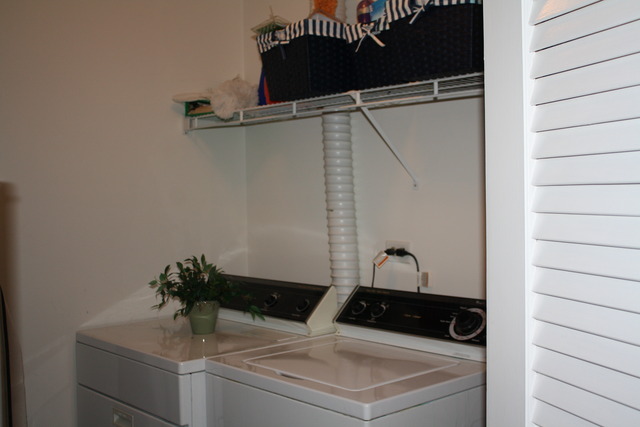 8251 Ripple Ridge Darien, IL 60561 - Photo 22 of 24 a close view of a sink and cabinets