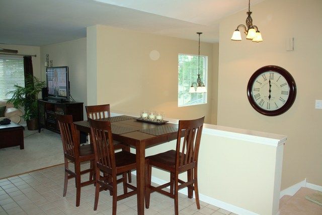 8251 Ripple Ridge Darien, IL 60561 - Photo 5 of 24 a view of a dining room with furniture and a large window