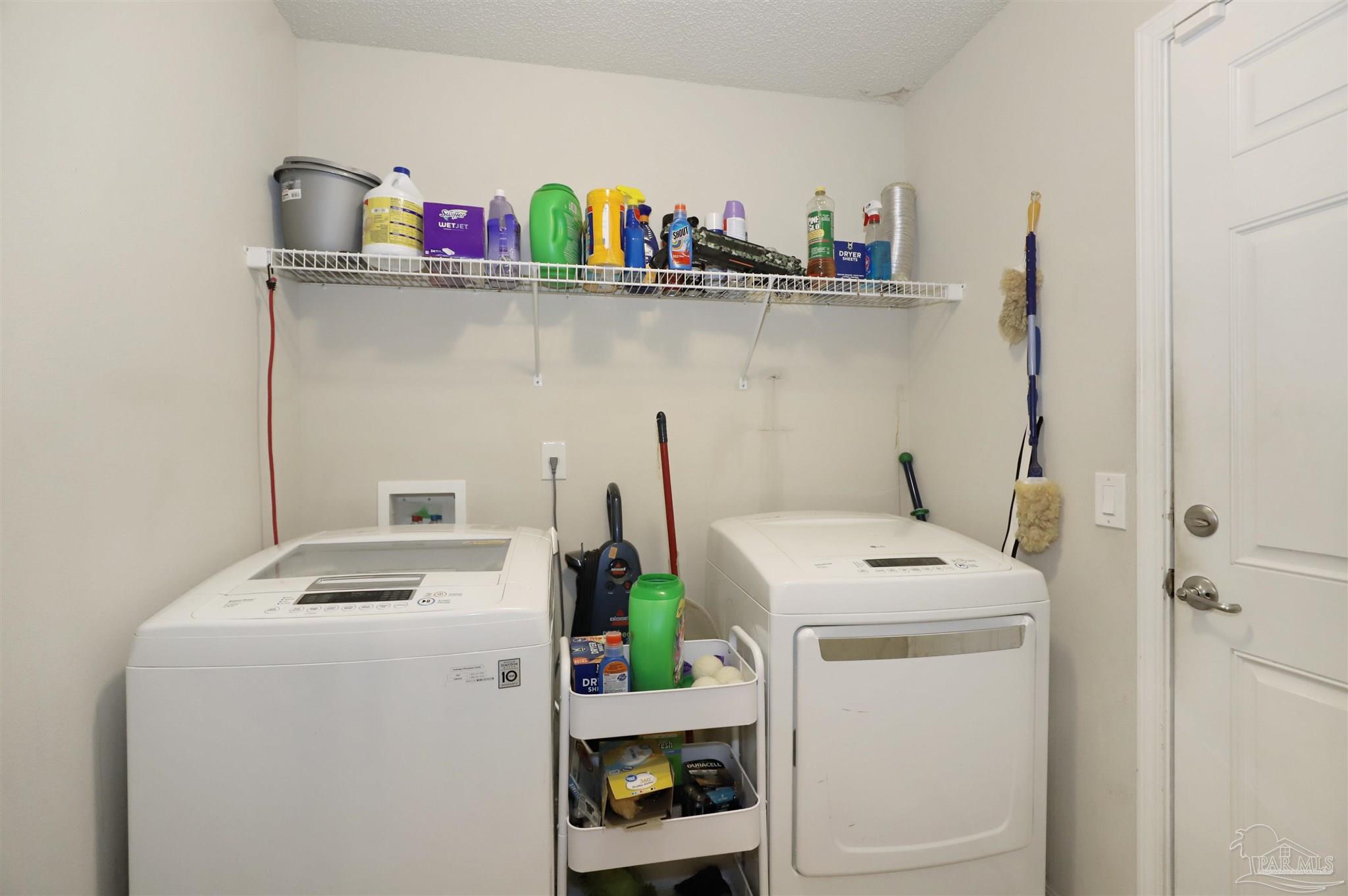6006 Patch Lane Pensacola, FL 32526 - Photo 19 of 32 a utility room with dryer and washer