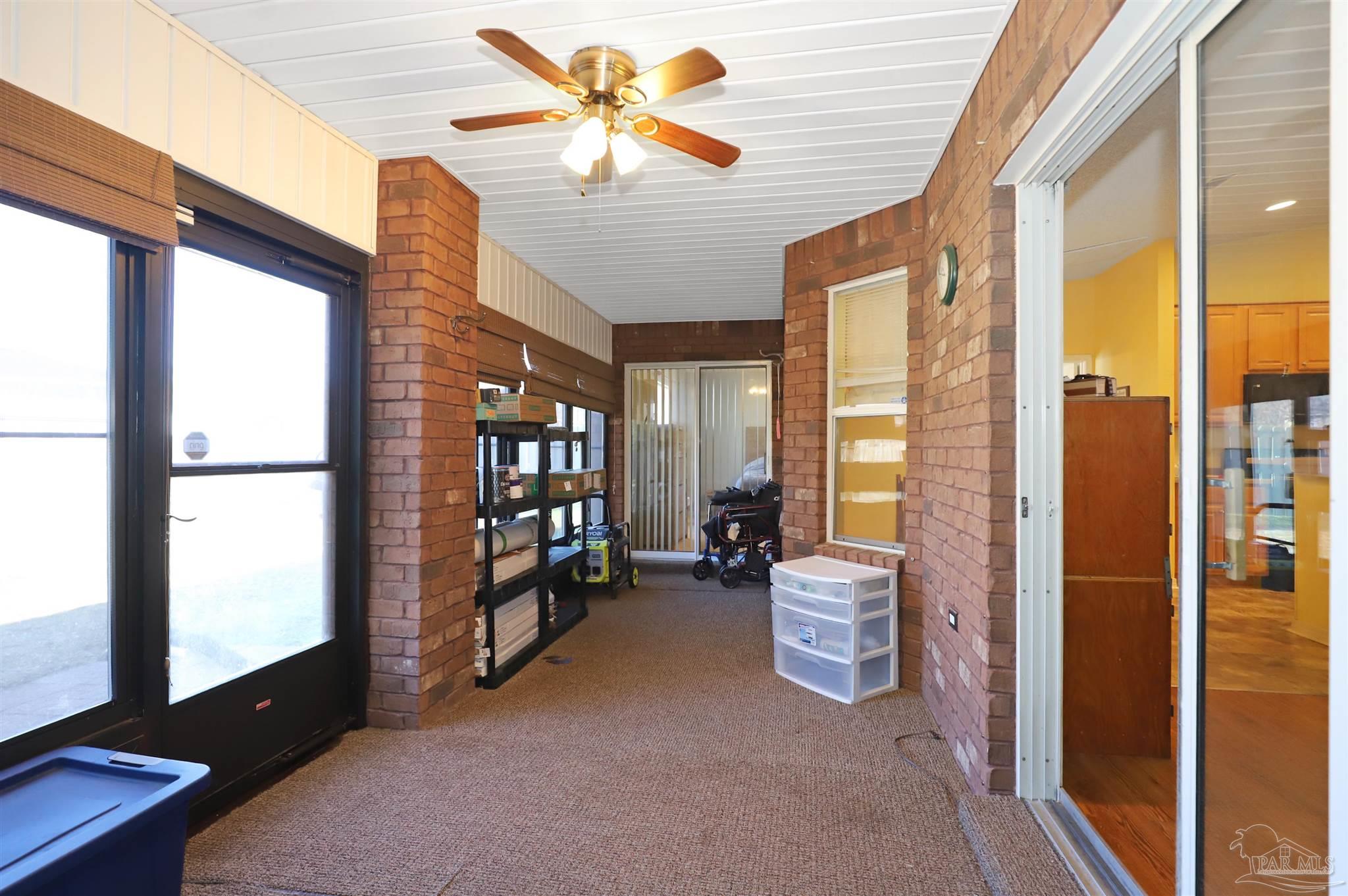 6006 Patch Lane Pensacola, FL 32526 - Photo 25 of 32 a view of a livingroom with furniture and a window