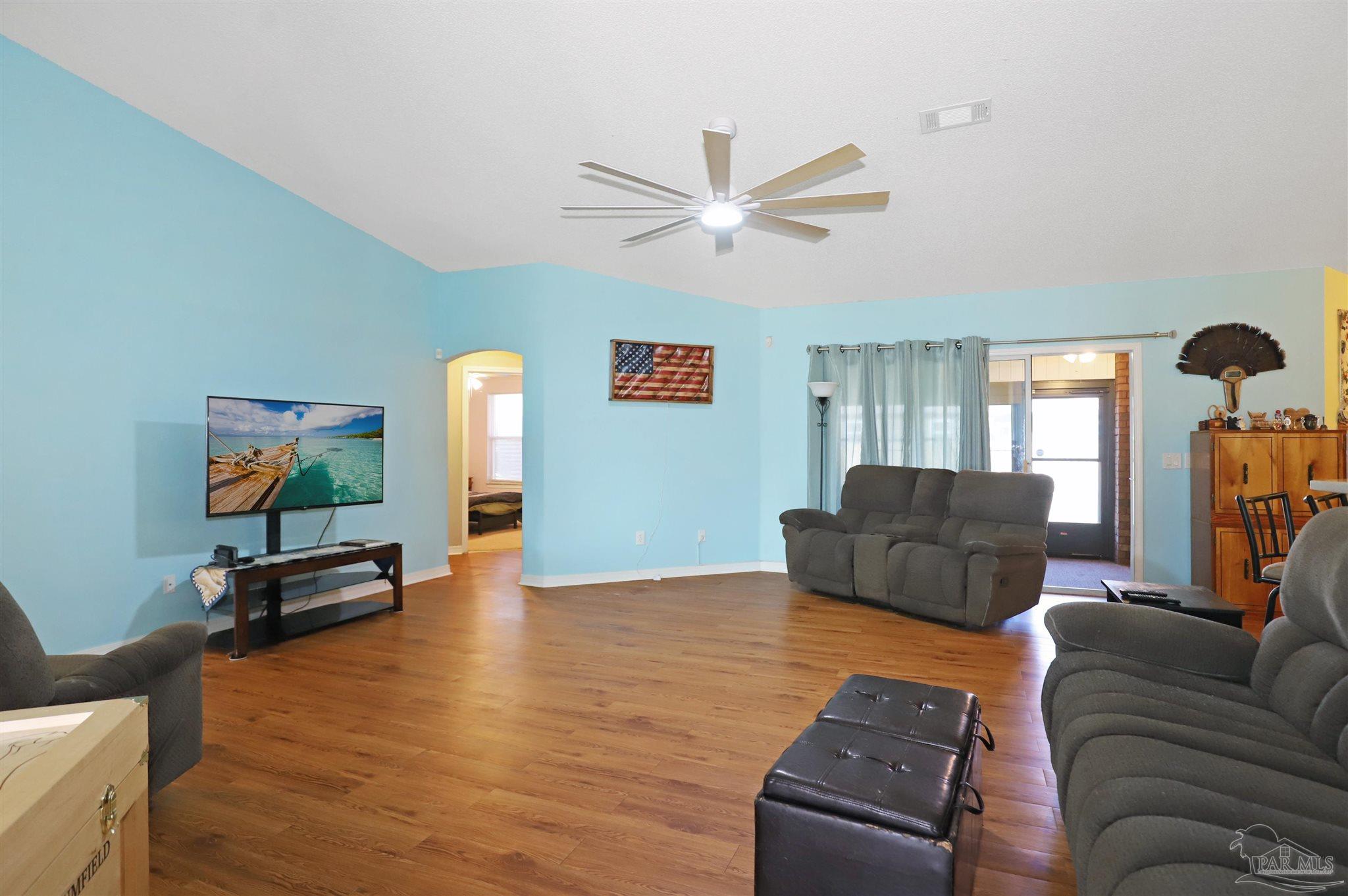 6006 Patch Lane Pensacola, FL 32526 - Photo 6 of 32 a living room with furniture and a flat screen tv