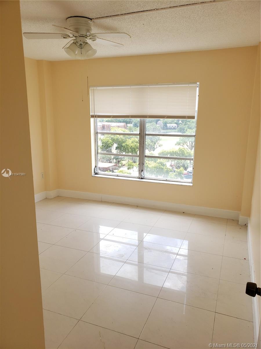 4174 Inverrary Drive, Unit 702 Lauderhill, FL 33319 - Photo 11 of 17 a view of a livingroom with a window