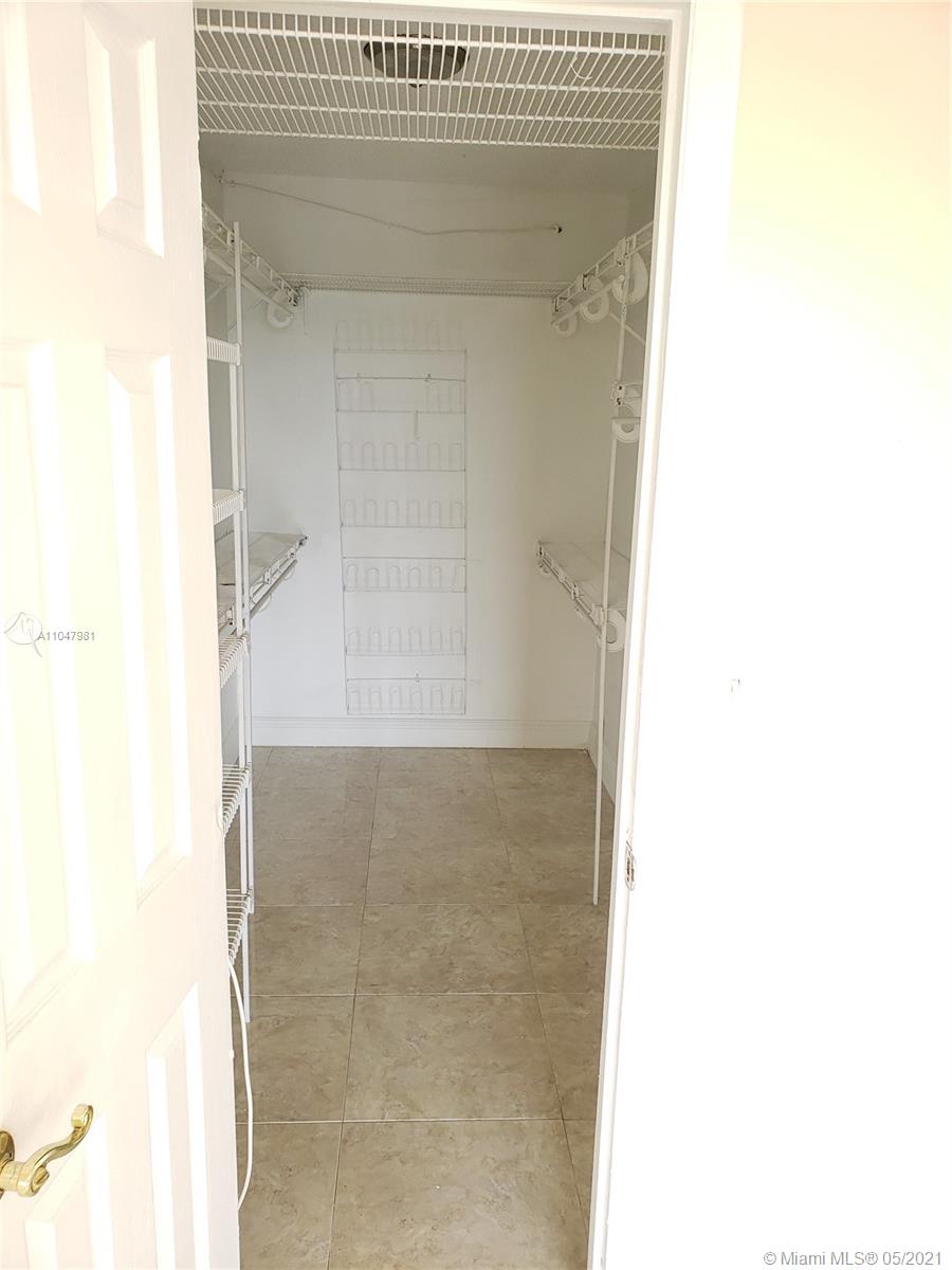 4174 Inverrary Drive, Unit 702 Lauderhill, FL 33319 - Photo 9 of 17 a bathroom with a window