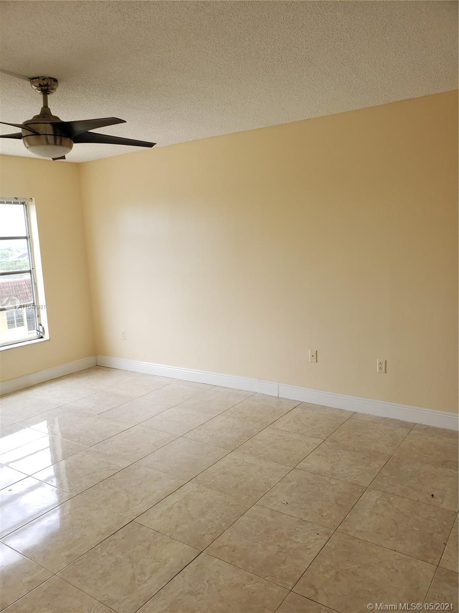 4174 Inverrary Drive, Unit 702 Lauderhill, FL 33319 - Photo 10 of 17 a view of a room with an empty space
