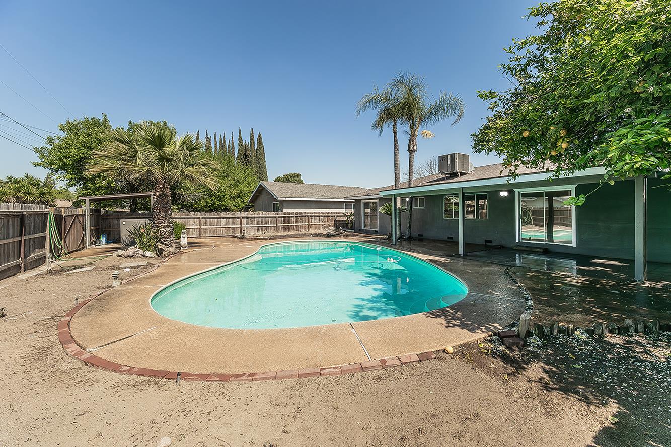 1375 South Cyrier Avenue Reedley, CA 93654 - Photo 31 of 34 a view of outdoor space yard and swimming pool
