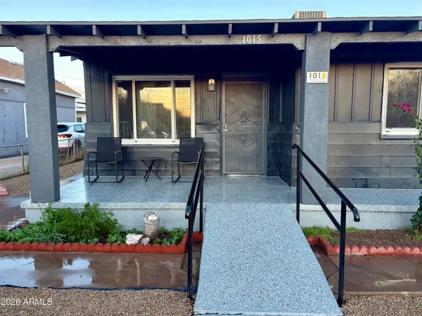 a front view of a house with garage
