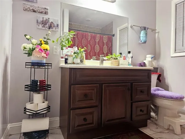 a kitchen with a sink and a stove