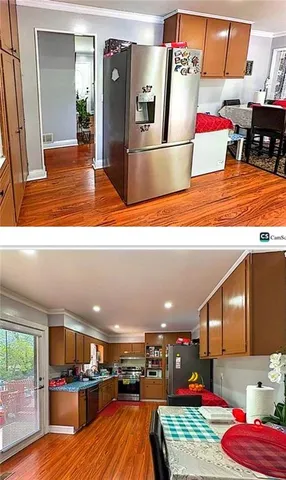 a kitchen with stainless steel appliances kitchen island granite countertop a refrigerator and stove