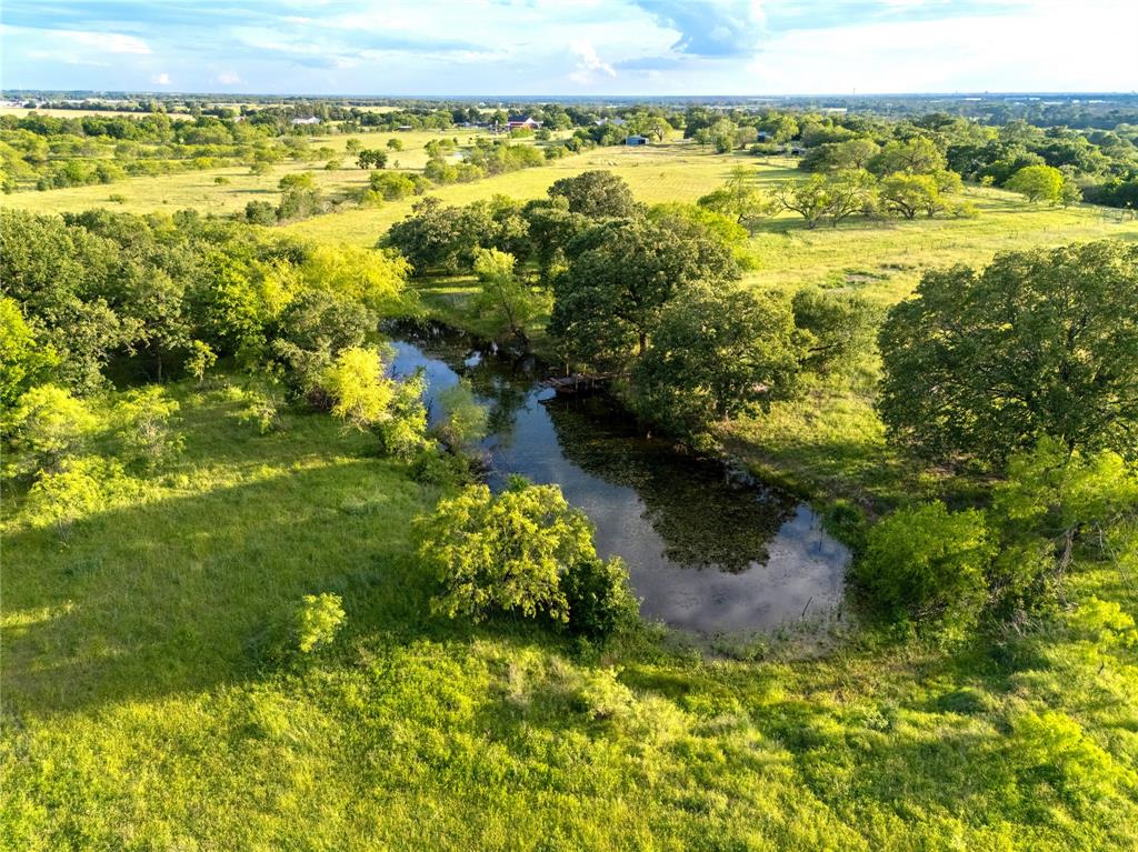 980 North League Ranch Road Waco, TX 76705 - Photo 29 of 39 a view of a lake with a mountain in the background