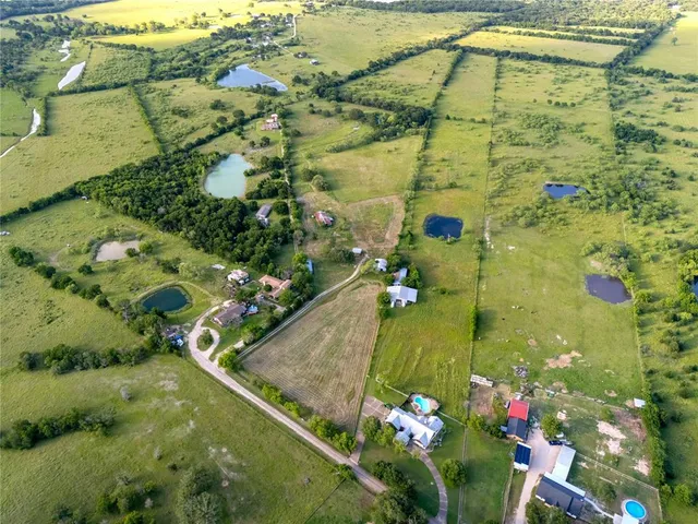 a view of swimming pool from a lake view