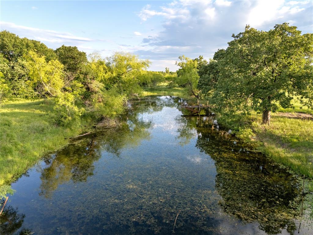 980 North League Ranch Road Waco, TX 76705 - Photo 32 of 39 a view of a lake with a yard