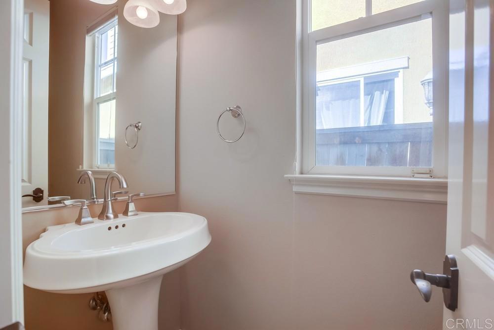 421 North Cedros Avenue Solana Beach, CA 92075 - Photo 11 of 54 a bathroom with a sink and a mirror