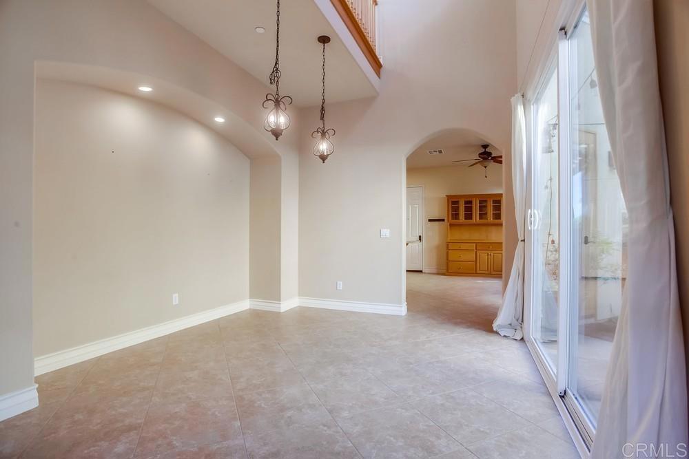 421 North Cedros Avenue Solana Beach, CA 92075 - Photo 12 of 54 a view of a livingroom with a ceiling fan and kitchen view