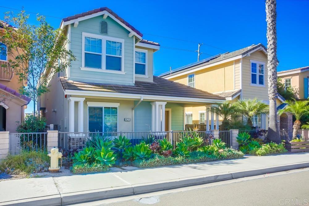 421 North Cedros Avenue Solana Beach, CA 92075 - Photo 2 of 54 a front view of a house with garden