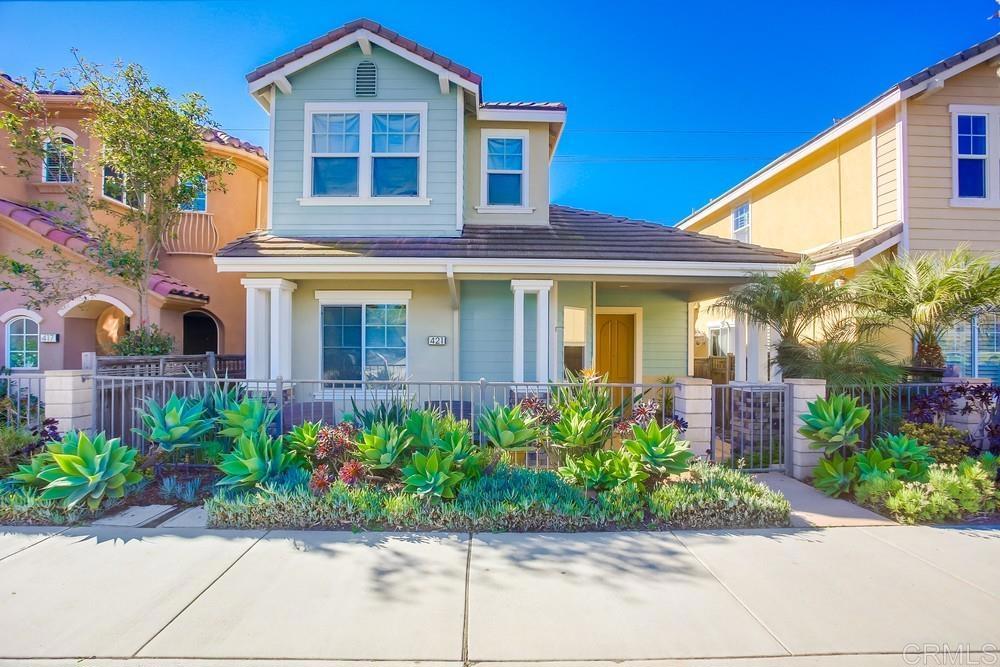421 North Cedros Avenue Solana Beach, CA 92075 - Photo 3 of 54 a front view of a house with a garden