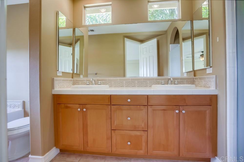 421 North Cedros Avenue Solana Beach, CA 92075 - Photo 31 of 54 a bathroom with a sink and a mirror