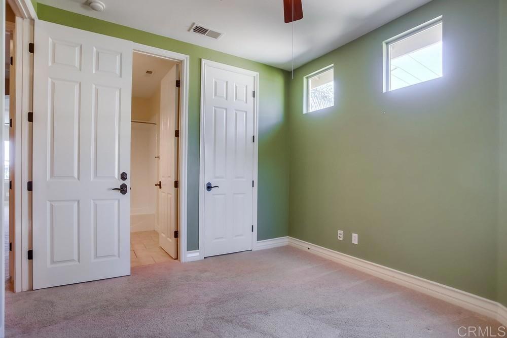 421 North Cedros Avenue Solana Beach, CA 92075 - Photo 34 of 54 an empty room with windows and closet