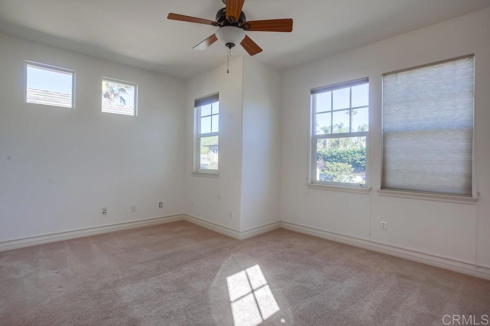 421 North Cedros Avenue Solana Beach, CA 92075 - Photo 39 of 54 an empty room with windows and fan view