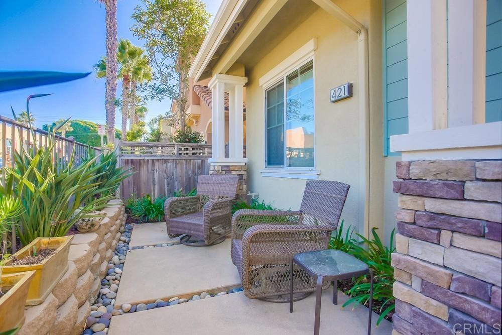 421 North Cedros Avenue Solana Beach, CA 92075 - Photo 5 of 54 a view of a patio with couches table and chairs and potted plants