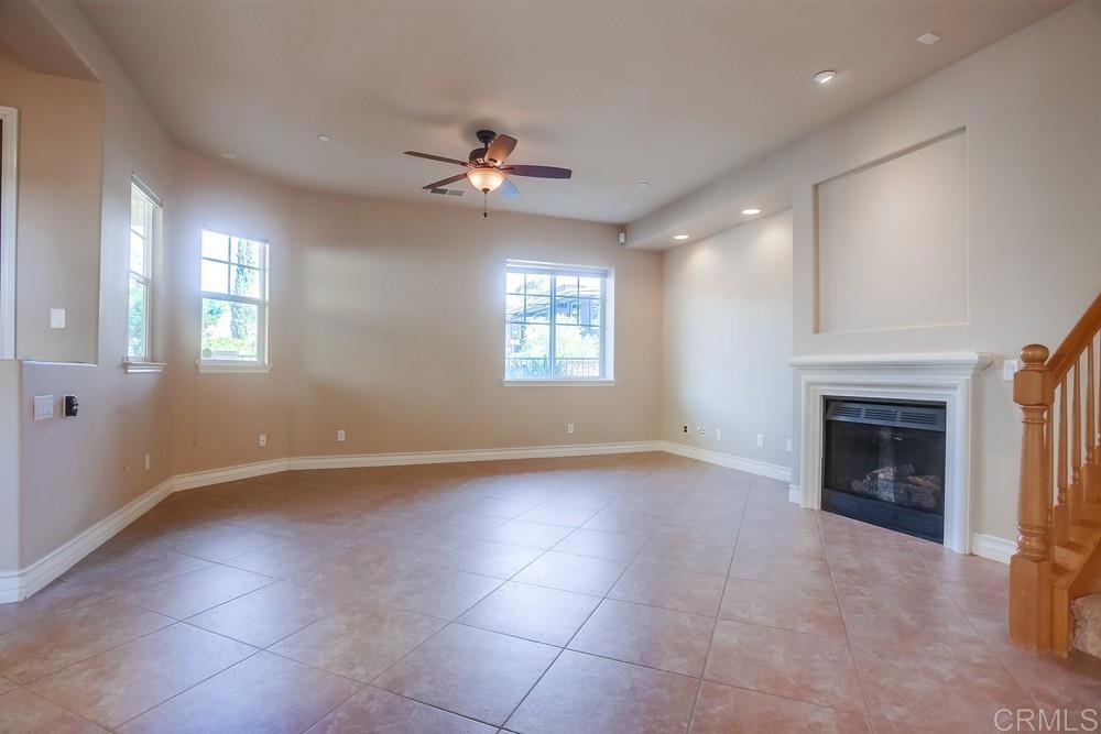 421 North Cedros Avenue Solana Beach, CA 92075 - Photo 9 of 54 a view of an empty room with a fireplace and a window