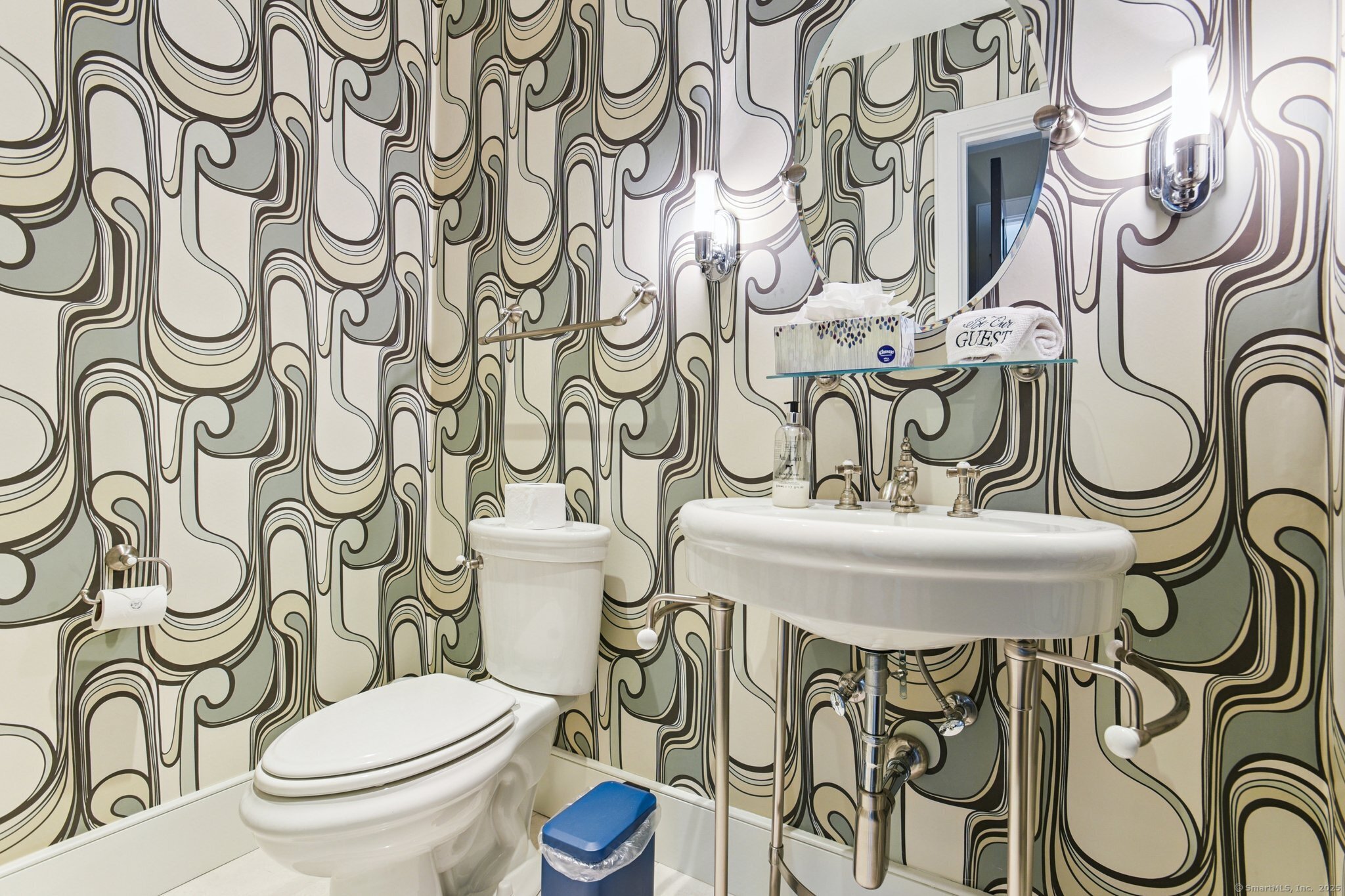 455 Stonington Road Stonington, CT 06378 - Photo 21 of 39 a bathroom with a toilet sink and mirror on the wall