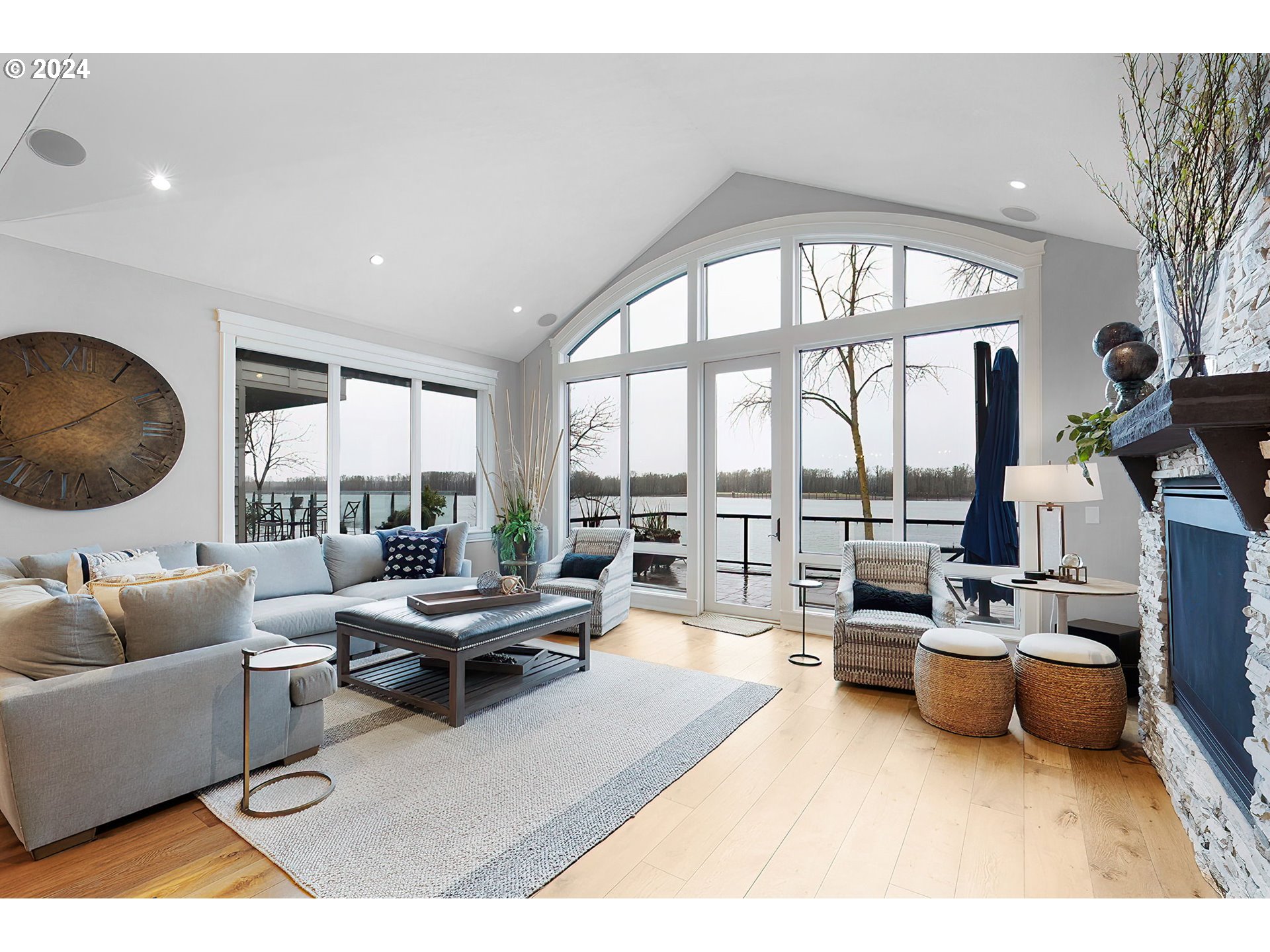 15421 Southeast Rivershore Drive Vancouver, WA 98683 - Photo 12 of 39 a living room with furniture and a large window