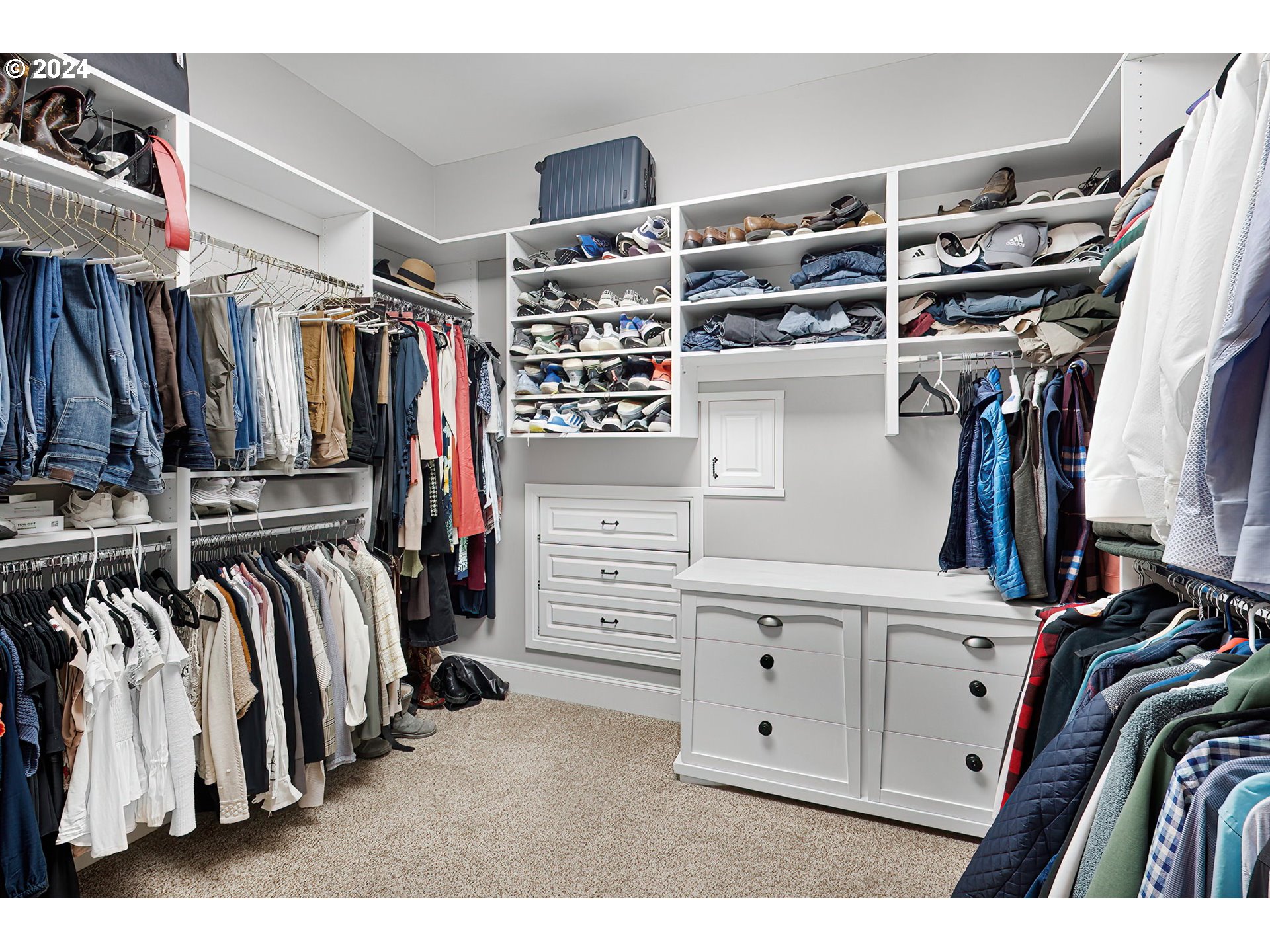 15421 Southeast Rivershore Drive Vancouver, WA 98683 - Photo 25 of 39 a view of walk in closet with clothes and shoes