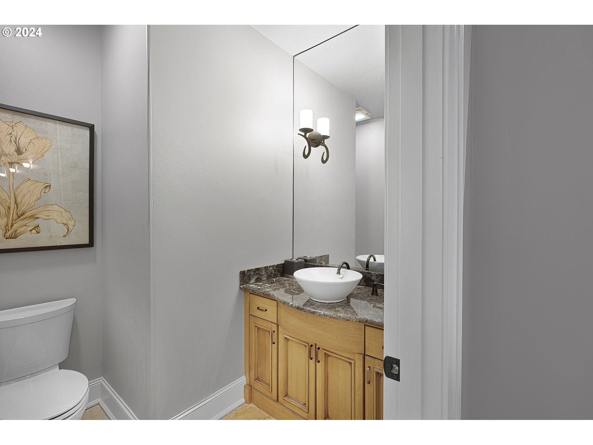 15421 Southeast Rivershore Drive Vancouver, WA 98683 - Photo 26 of 39 a bathroom with a sink and a mirror