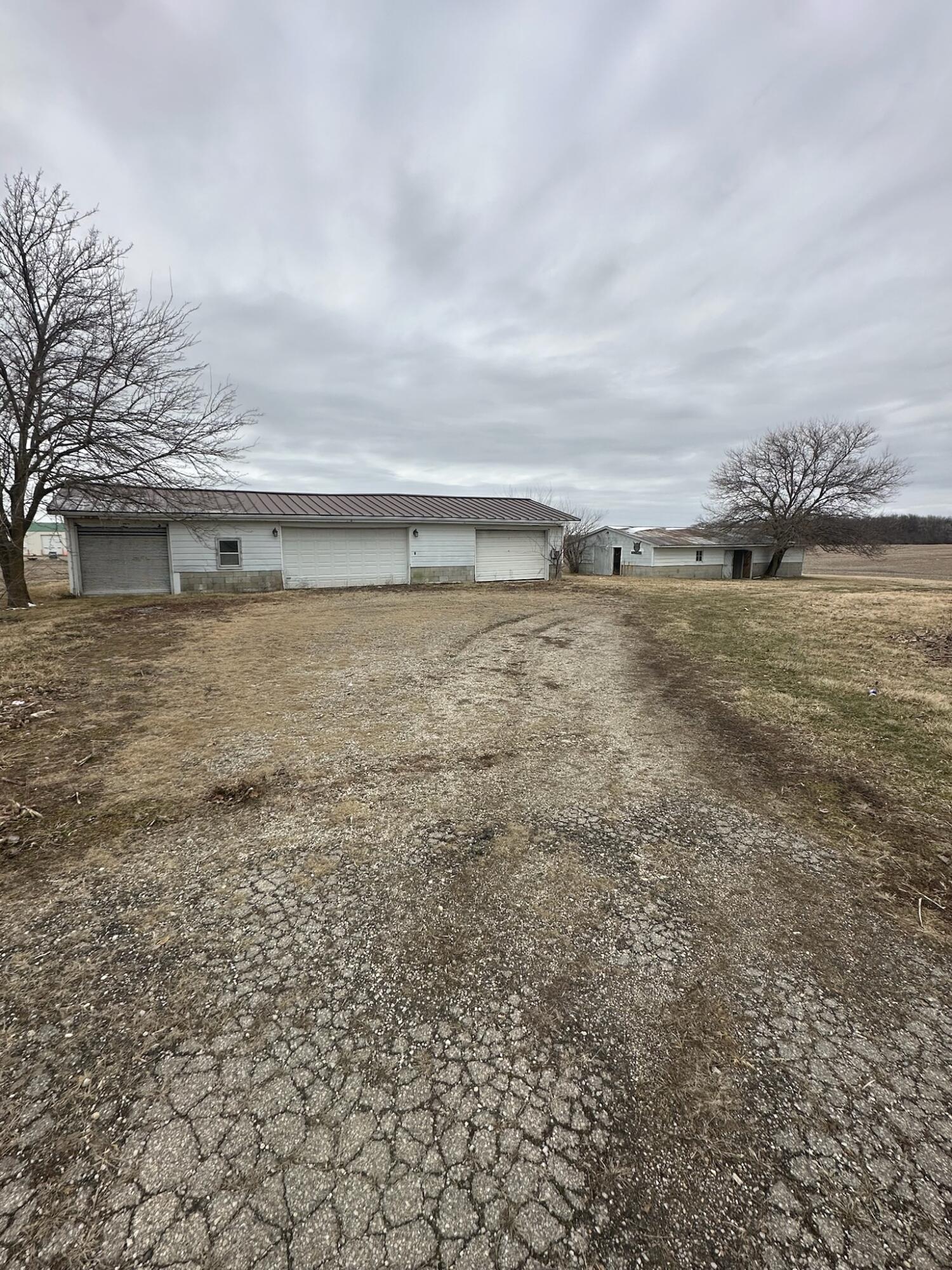 4701 South 1st Redkey, IN 47373 - Photo 20 of 29 a view of a dry yard with wooden fence