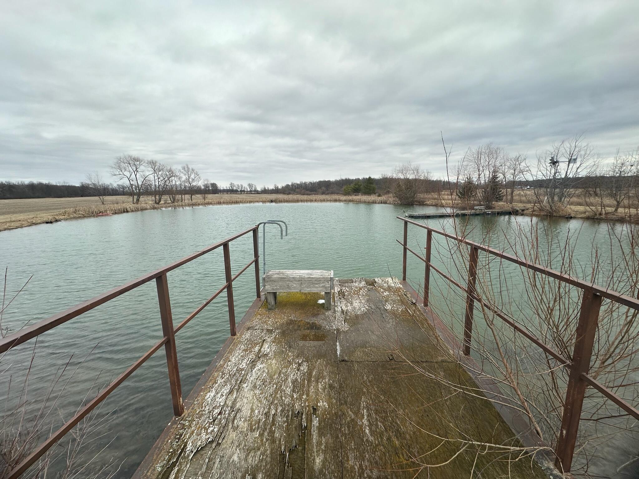 4701 South 1st Redkey, IN 47373 - Photo 23 of 29 a view of a lake next to a bridge