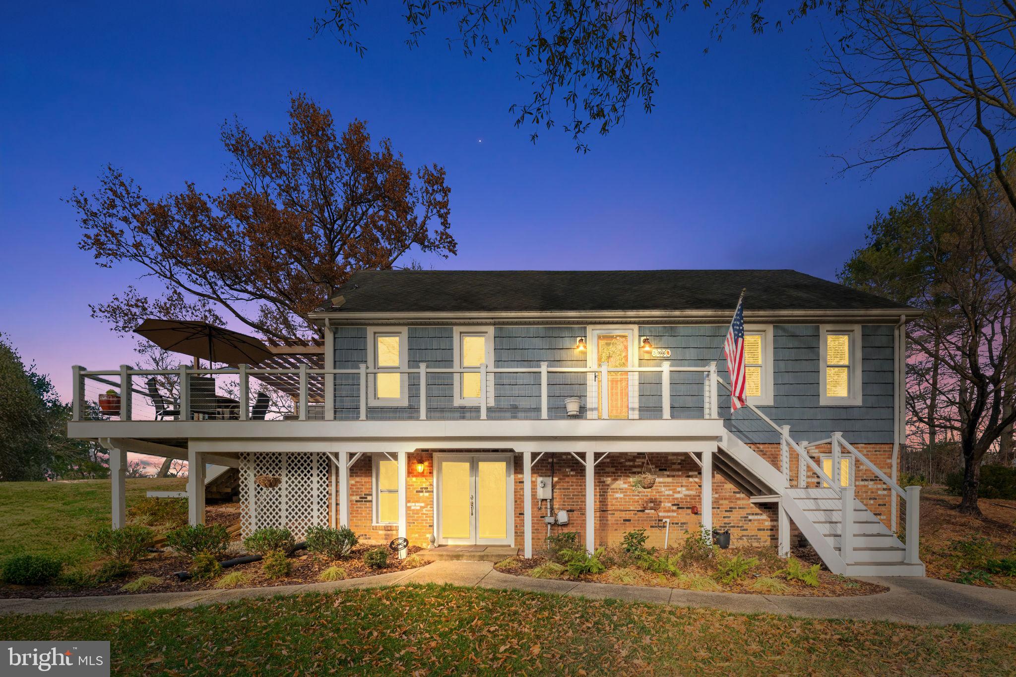 9666 Springs Road Warrenton, VA 20186 - Photo 1 of 77 front view of a house with a yard
