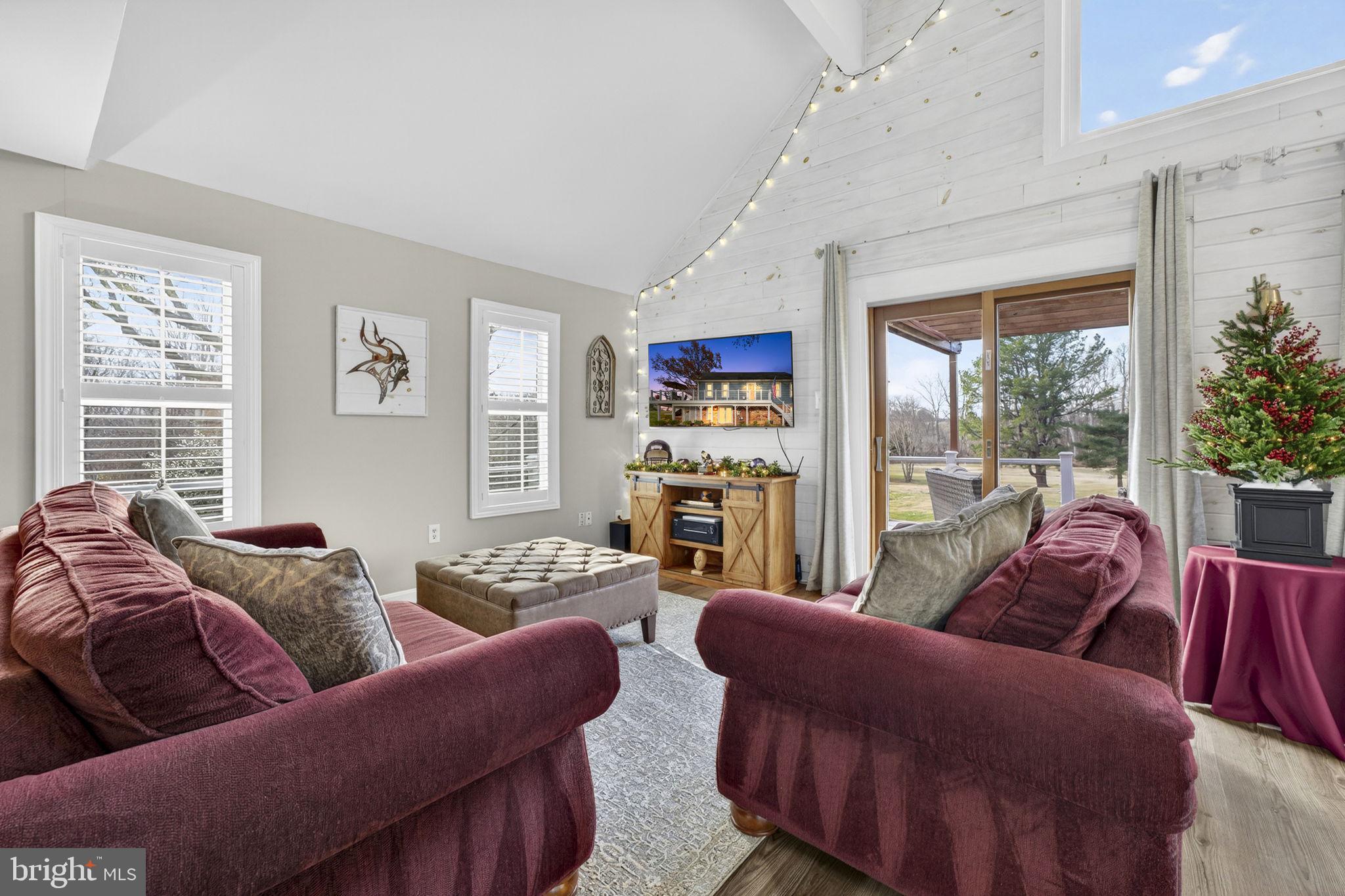 9666 Springs Road Warrenton, VA 20186 - Photo 17 of 77 a living room with furniture and a large window
