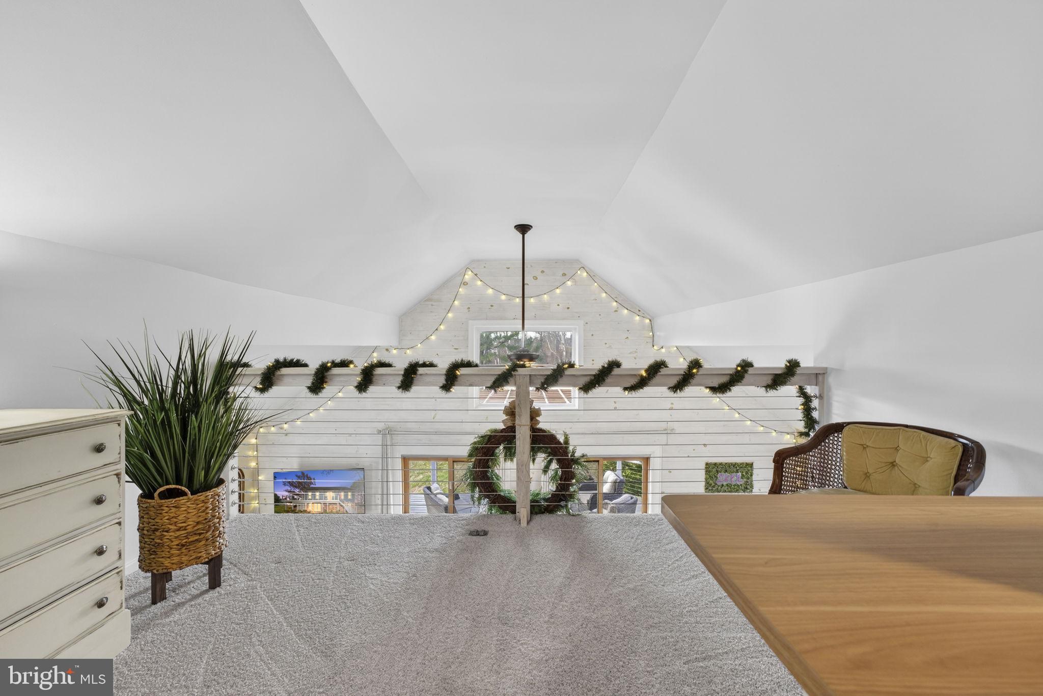 9666 Springs Road Warrenton, VA 20186 - Photo 33 of 77 a living room with furniture and a chandelier