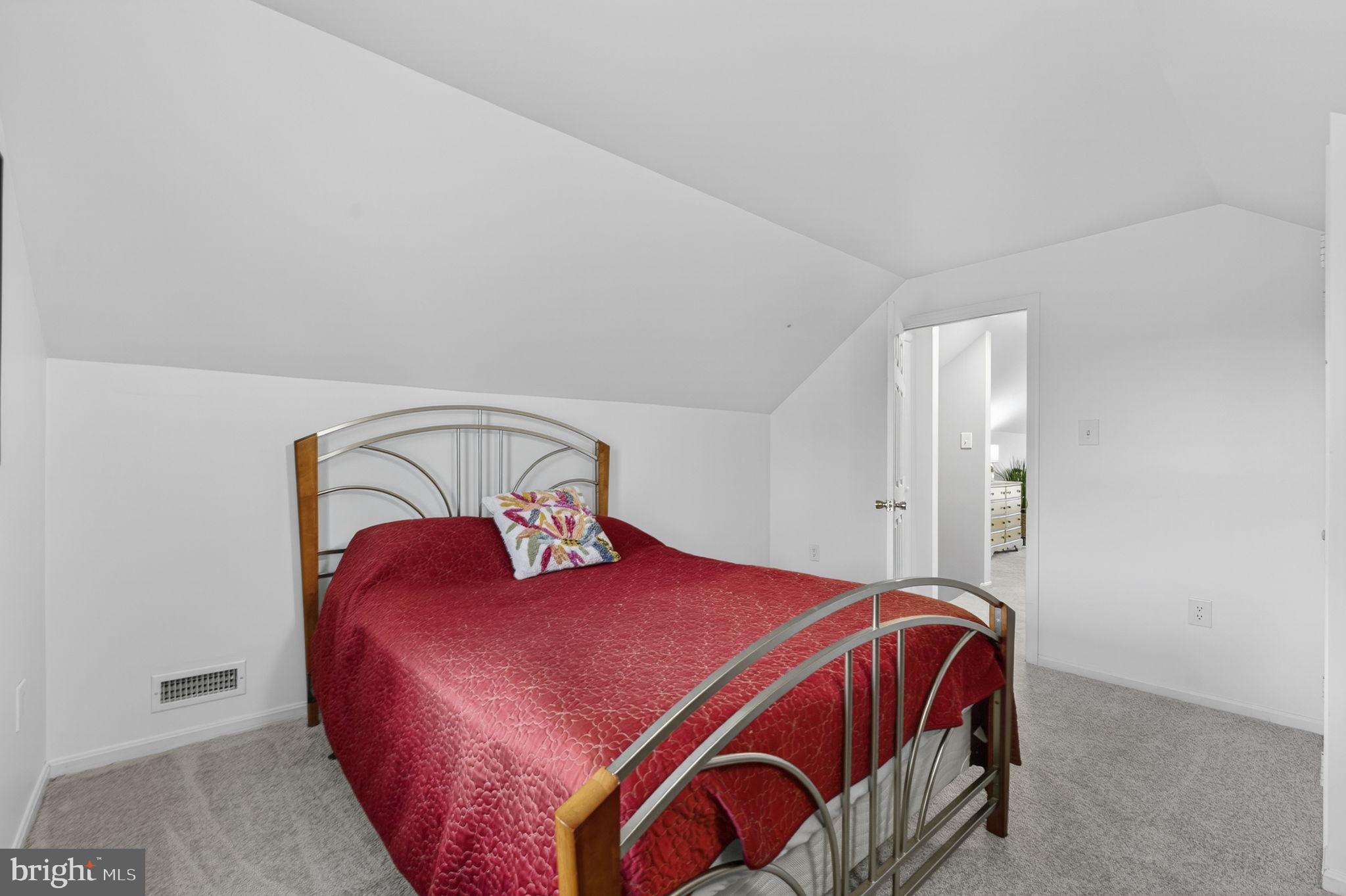 9666 Springs Road Warrenton, VA 20186 - Photo 54 of 77 a bedroom with a bed and window