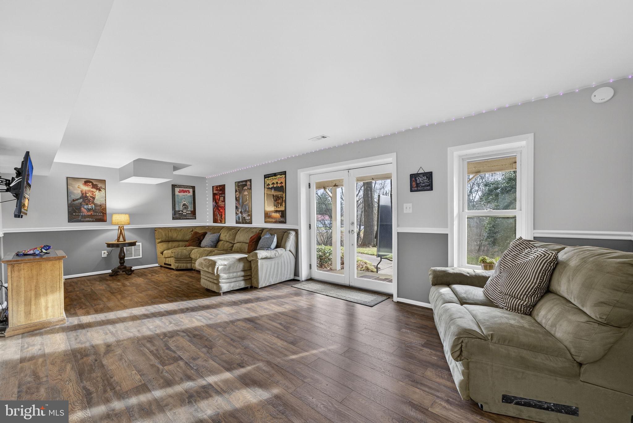 9666 Springs Road Warrenton, VA 20186 - Photo 57 of 77 a living room with furniture and large window