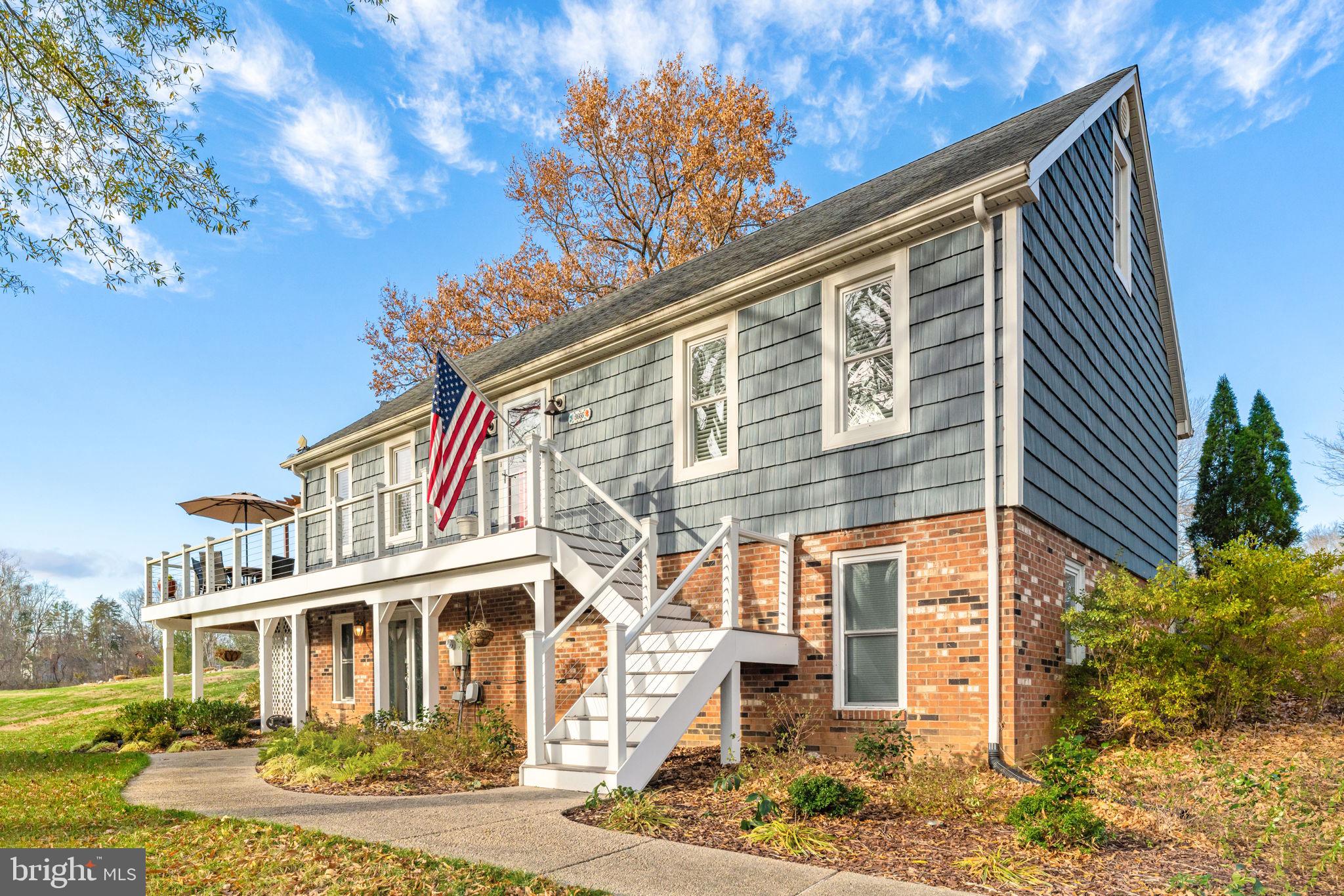 9666 Springs Road Warrenton, VA 20186 - Photo 7 of 77 front view of a house with a yard