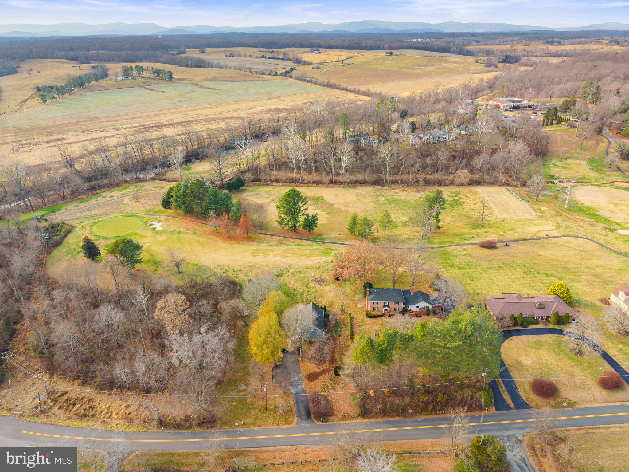 9666 Springs Road Warrenton, VA 20186 - Photo 75 of 77 a view of an ocean and a mountain