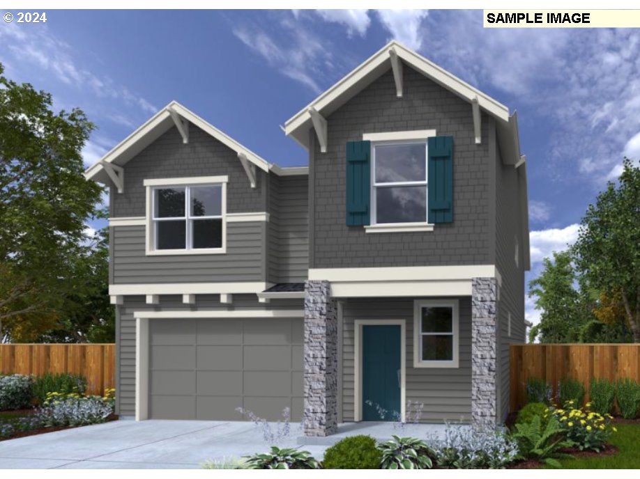 8727 North 3rd Street, Unit 38 Ridgefield, WA 98642 - Photo 1 of 33 a front view of a house with garage