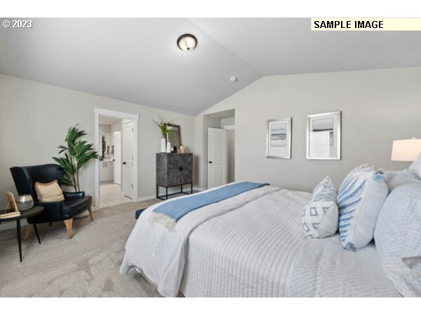 8727 North 3rd Street, Unit 38 Ridgefield, WA 98642 - Photo 12 of 33 a bedroom with a bed and a couch