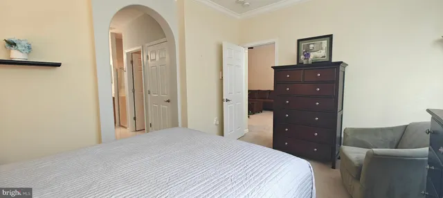 a bathroom with a sink toilet vanity and shower